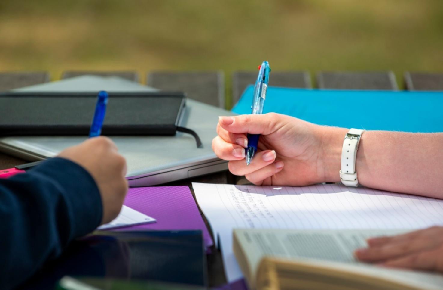 Person reviewing financial statements and investment options